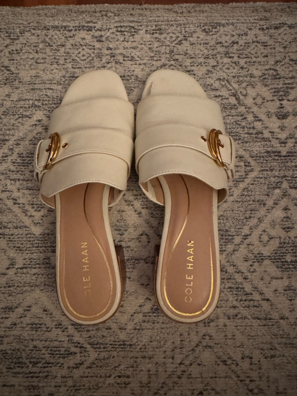 Cole Haan Ivory Slide Mules with Gold Buckle
